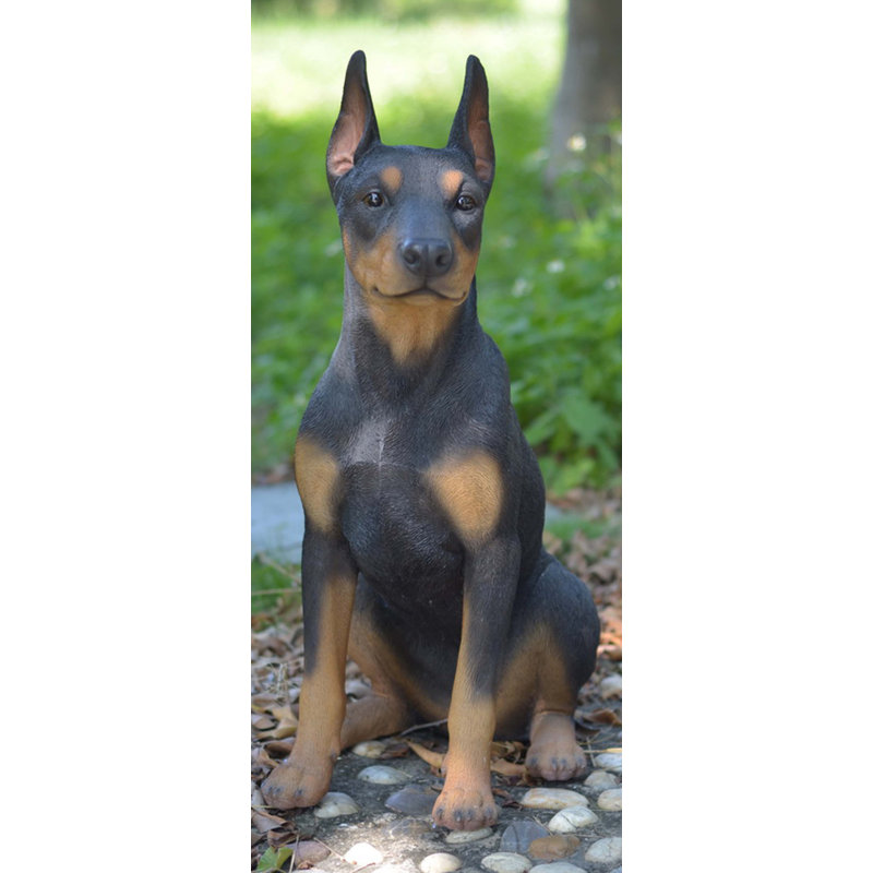 sitting doberman statue